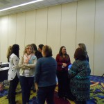Attendees networking at PDTA conference