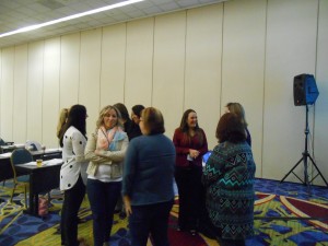 Attendees networking at PDTA conference