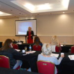 Dr Kara Morris speaking at PDTA