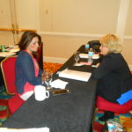 Conference attendees strategizing